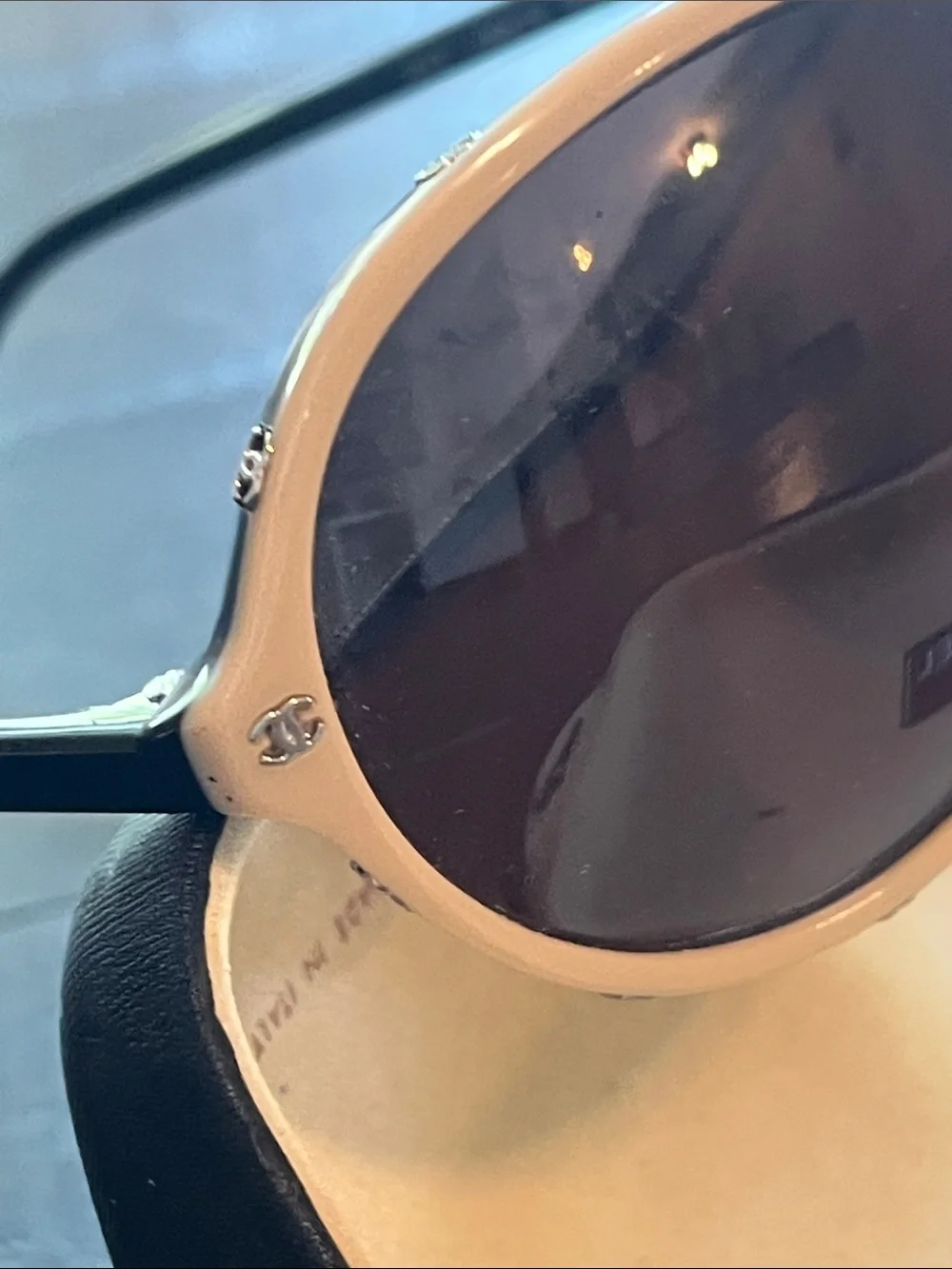 CHANEL Peach Frame Sunglasses with Dark Brown Lenses and Black Temples